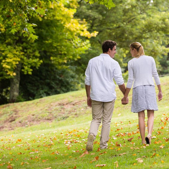 young couple walking hand in hand